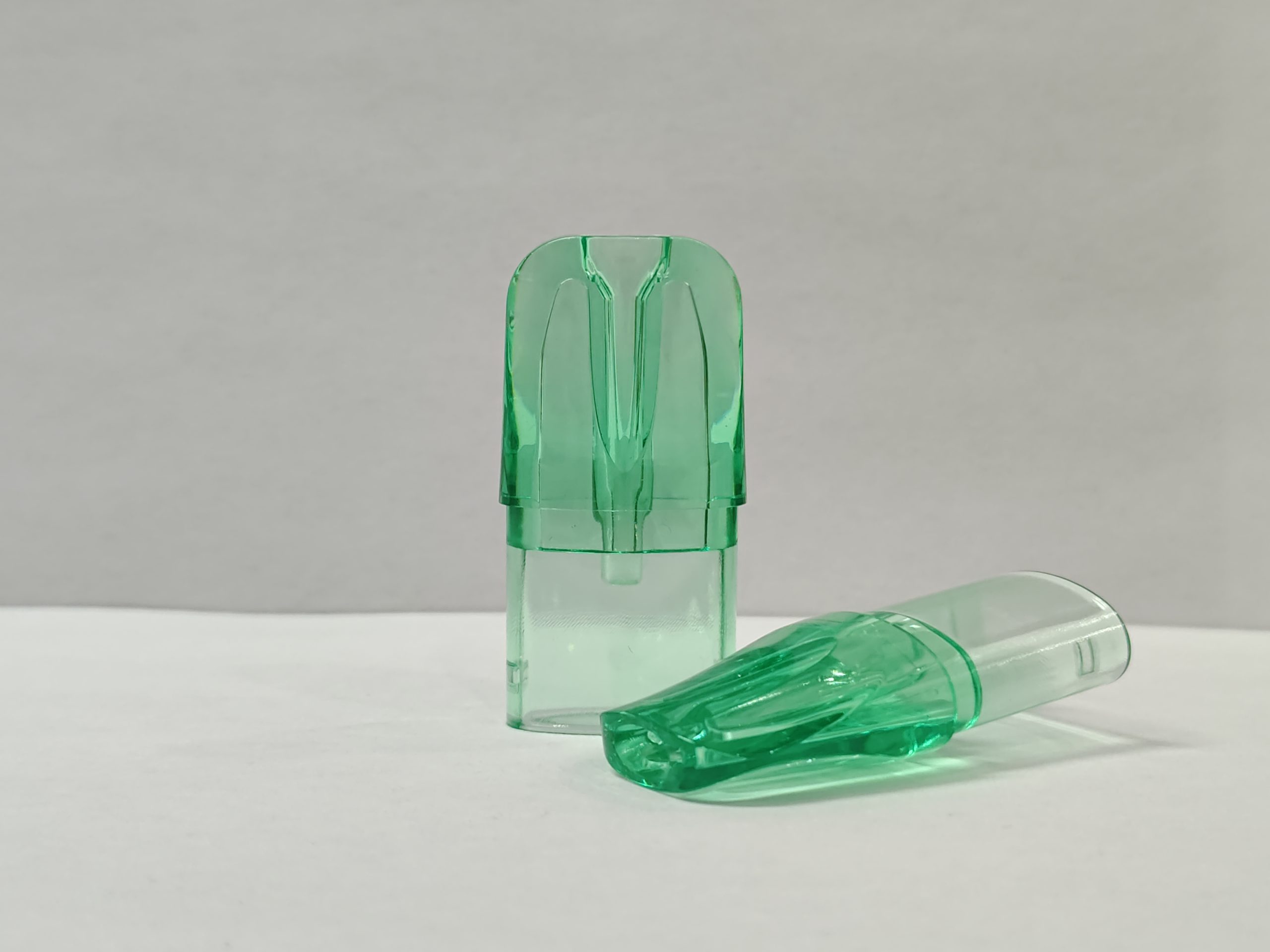Dual clear pod set showing paired shells